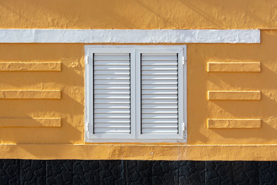 Weathered painted wall showing surface texture